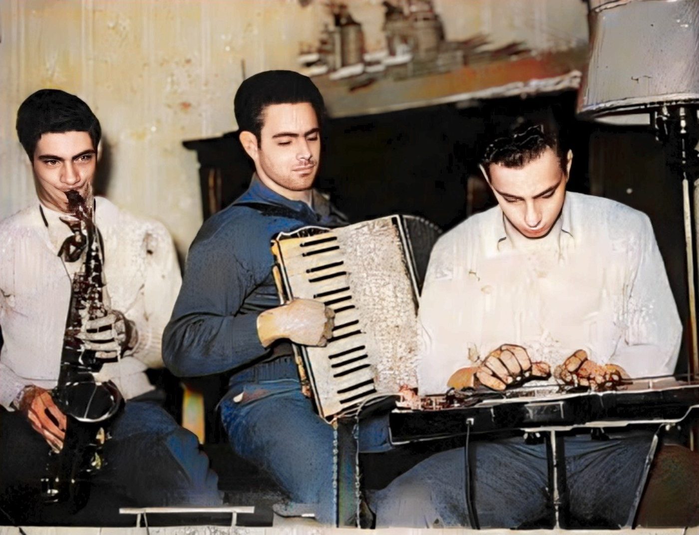 On accordion, with his brothers Tom and Bill. Colorized.