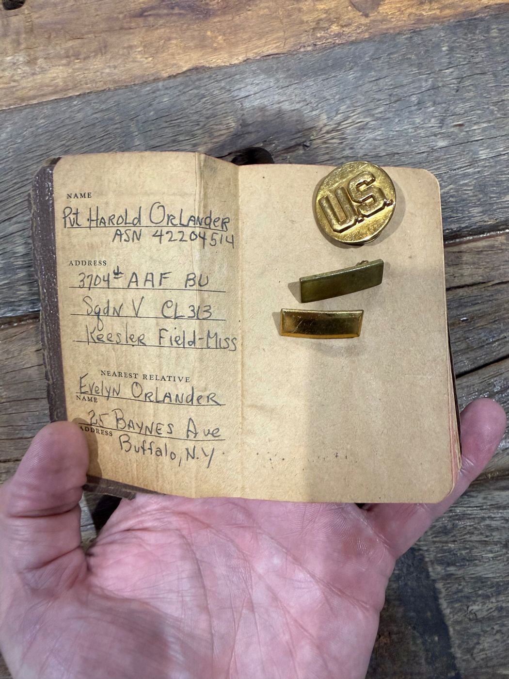 The first page of the Testament, in Harold Orlander's hand, with the brass beside it.
