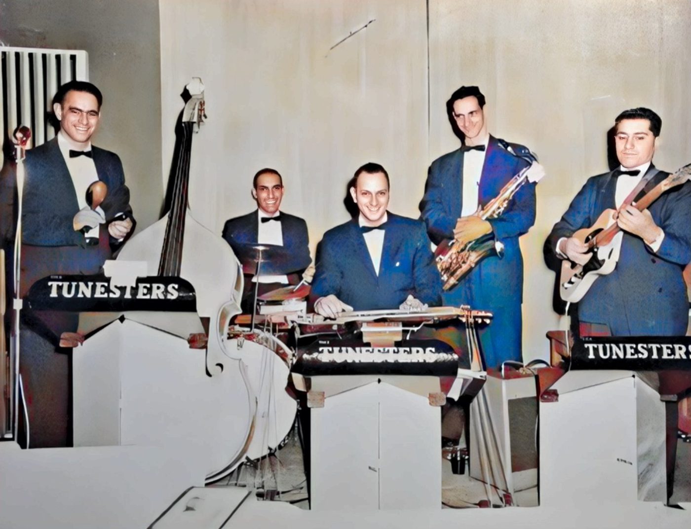 The Tunesters. From left: my grandfather, Larry Castriotta, Bill Valletta, Tom Valletta and Augustino Patalano. Colorized.